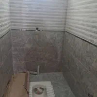 نصب کاشی سیمانی‌وچسبی با کارت مهارت