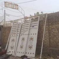 درب حیاط ارتفاع ۳متر و به عرض ۳.۳۵