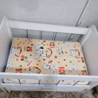 تخت گهواره ای کودک