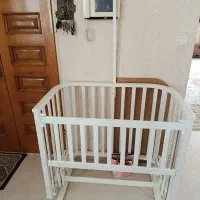 تخت گهواره ای نوزاد