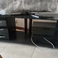 میز تلویزیون شیشه ای بدون خط خش