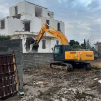 تخریب ساختمان گودبرداری فنداسیون بیل‌مکانیکی لودر