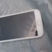 یک عدد گوشی جی۵ درحدنو فقط کارتون ندارد