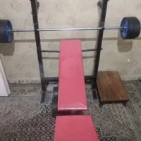 میز بدنسازی به همراه دمبل ووزنه