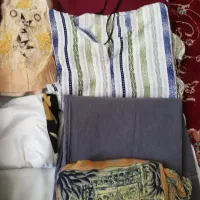 تعدادی لباس همش با هم