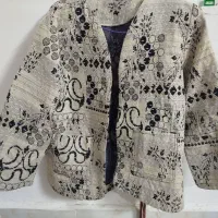 کت گیلیمی|لباس|مشهد, طبرسی شمالی|دیوار