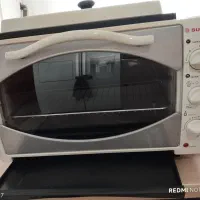 آون توستر وتعدادی وسیله آشپزخانه