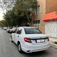 نصف گلگیر عقب سمت راننده و جای پلاک عقب رنگ