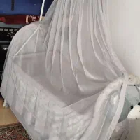 گهواره کنار تخت مادر