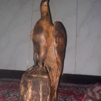 مجسمه چوب گردو کاملا کار دست