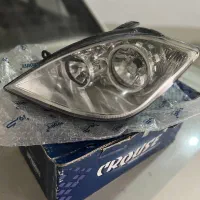 یک عدد چراغ جلو کروز تیبا