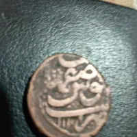 یک سکه مربوط به دوره صفویان ضرب اصفهان