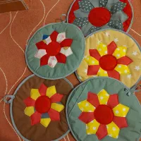 زیر قابلمه ای یا زیر بشقابی و دستگیره