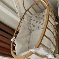 گهواره تخت کنار مادر