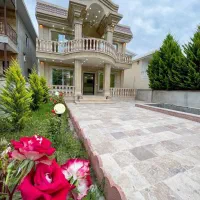 خونه ویلایی کلاسیک استخردار محیطی دنج و اروم