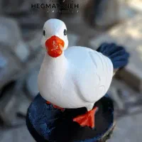 مجسمه اردک بتنی سفید