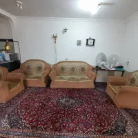 مبل هفت نفره همراه با میز شیشه ای