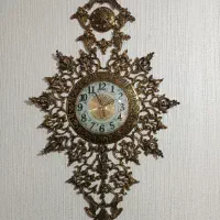 ساعت آرام گرد برنجی