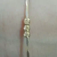 یک عدد النگو  ۱۰۰ بالای تابلو