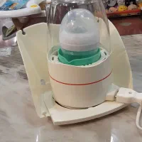 سیسمونی،دستگاه استریلیزه وگرم کننده شیر