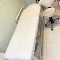 تخت چرمی تاشو ماساژ و مژه سالنی و صندلی چرخدار