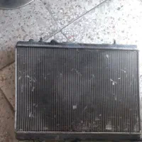 رادیاتور اب ۲۰۶ و تعدادی روغن