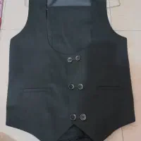 یک عدد جلیقه و شلوار بچه گانه