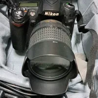 Nikon D90 به همراه کوله و سه پایه