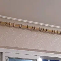 چوب پرده طلایی