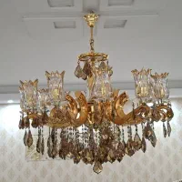 لوستر ۱۲ شاخه دیوارکوب کنارسالنی کریستال ناخمن