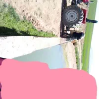 سم پاشی با تراکتور جفت