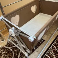 سیسمونی نوزاد کریر و گهواره