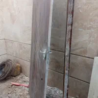 کوم آهنی و درب چوبی