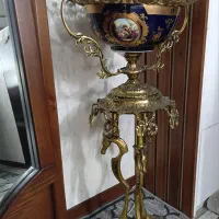 میوه خوری کنار سالنی برنز