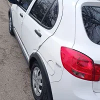 کوییک R سفید مشکی بی رنگ