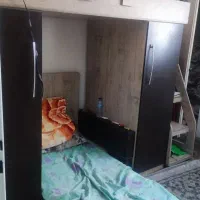 تخت دو طبقه با کمد لباس .تشک