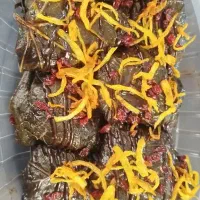 دلمه برگ مو با سس انار