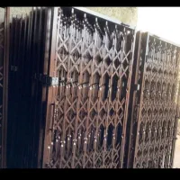 در حفاظ درب محافظ اپارتمان ریلی کشویی آکاردئون ساد