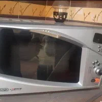 ماکرویو دلونگی مدل f663 و پلوپز Midea
