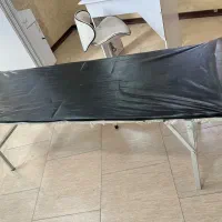 تخت مطبی پایه تاشو روکش چرمی