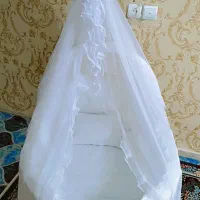 گهواره کنار مادر