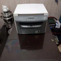 پرینتر  چهار کاره کنون کم کارکرد ۴۰۱۰