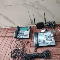 مودم وای فای و گوشی تلفن سیم و کابل تلفن