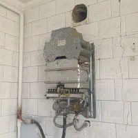 آبگرم کن بوتان .تازه سرویس شده