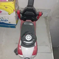 ماشین حمل نقل کودک مشکی قرمز