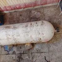 یک عدد کپسول بزرگ پژویی همراه ریگلاتور