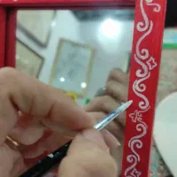 آینه و شمعدان چوبی با طرح ونقشهایی متنوع