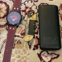 ساعت و چاقو انگشتر دلوار