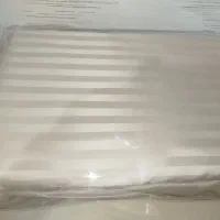 ملحفه کش دار با همرا رو بالشتی.