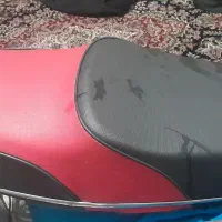 زین هوندا و کلاه کاسکت